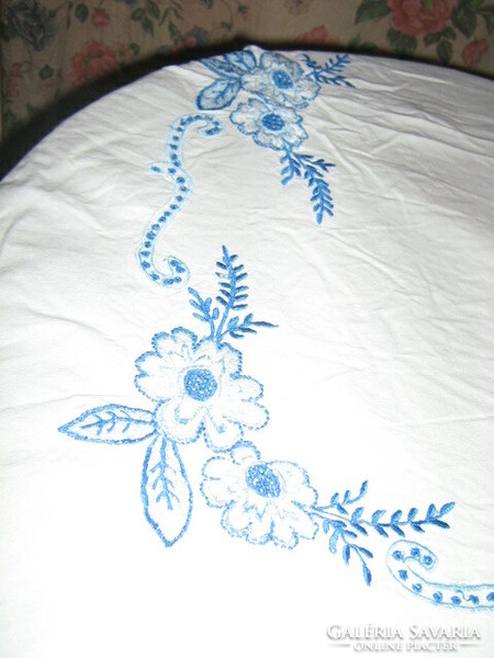 Beautiful vintage tablecloth embroidered with blue flowers