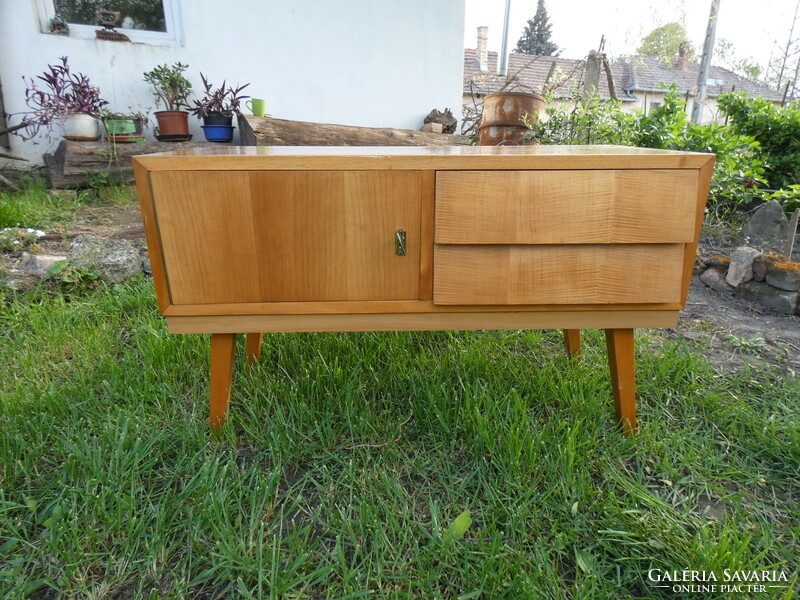 High-gloss sideboard (small chest of drawers) made of beech wood with ultra-cool drawers from the sixties.