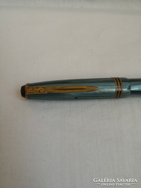 Signo brand pen with a gold tip