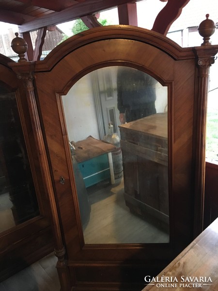 Baroque cupboards with hanging shelves and glass drawers to be renovated.