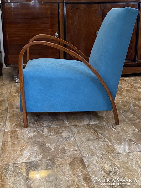 Art deco armchair with turquoise cover