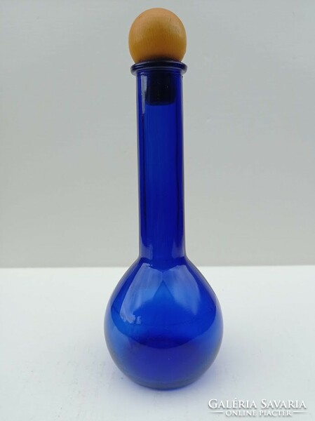 Glass bottle with cobalt blue stopper