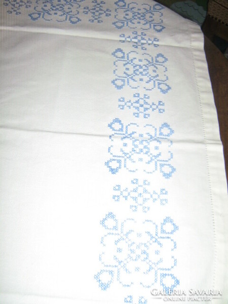 Tablecloth embroidered with beautiful blue cross-eyes