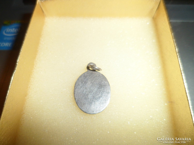 Antique silver putto pendant