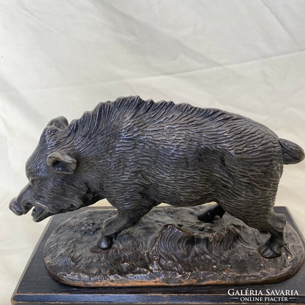Antique bronze boar statue