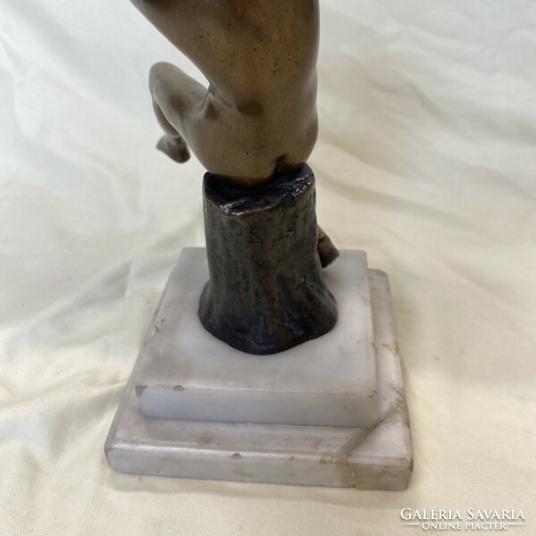Antique bronze female nude on a marble plinth