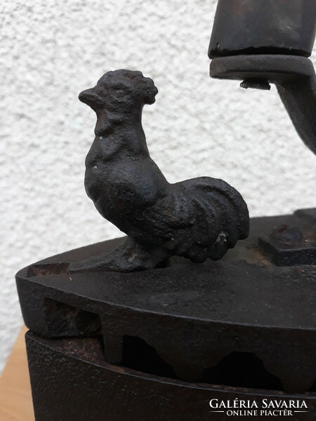 Antique cast iron iron with rooster