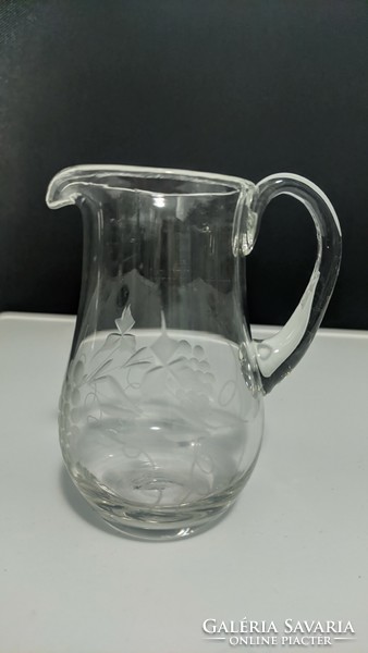Small old wine pouring jug