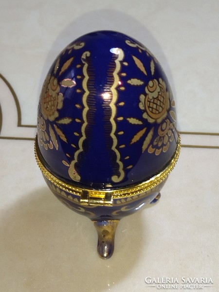 Beautiful cobalt blue gold flower patterned porcelain jewelry box in the shape of an egg