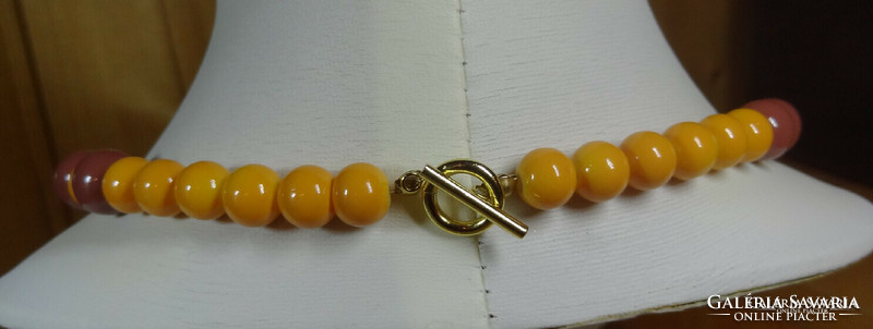 Pleasant yellowish caramel colored 2-in-1 acrylic necklace & earring set.