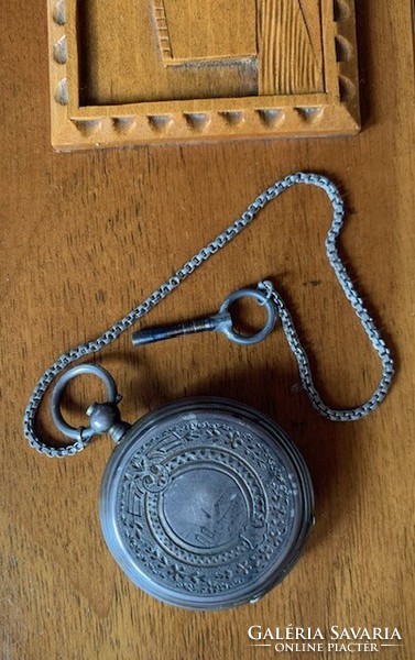 Women's pocket watch with key