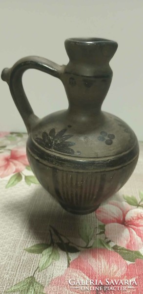 Black ceramic rattle jar
