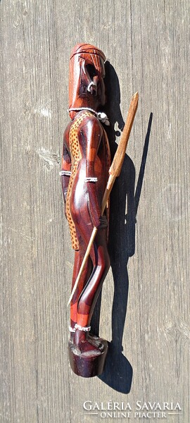 African carved wooden warrior statue