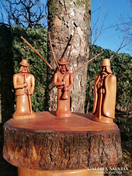 A group of three-figure folk carved sculptures (the work of Zoltán Carver)