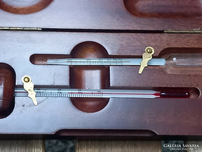Wine accessories: midcentury wine measuring set in a mahogany box