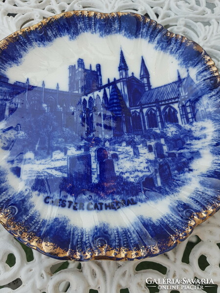 Blue scene wall plate painted under antique English glaze