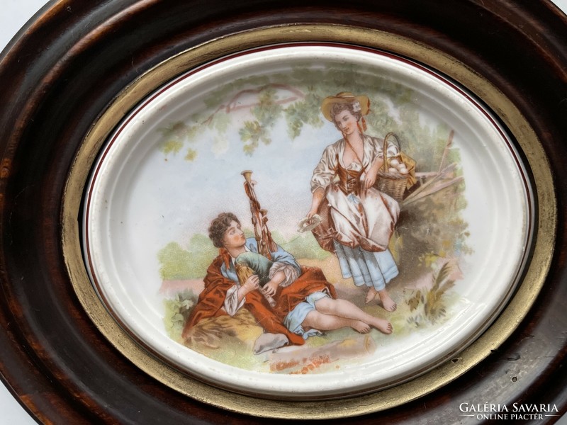 A beautiful oval porcelain picture with a baroque scene, I think it is Viennese.
