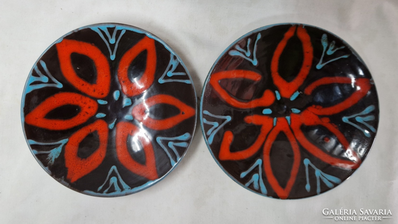 Retro applied art glazed ceramic plates or wall decorations are sold in pairs in flawless condition
