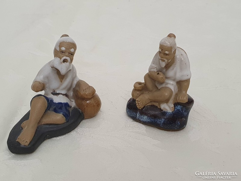Chinese fisherman ceramic figurines