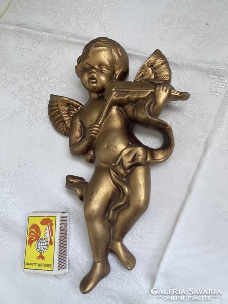Fairy wall-hanging ceramic putto angel.