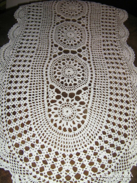Beautiful white hand-crocheted filigree tablecloth with Art Nouveau features