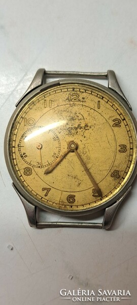 An early marriage of an interesting wristwatch to the 1940-50. from years