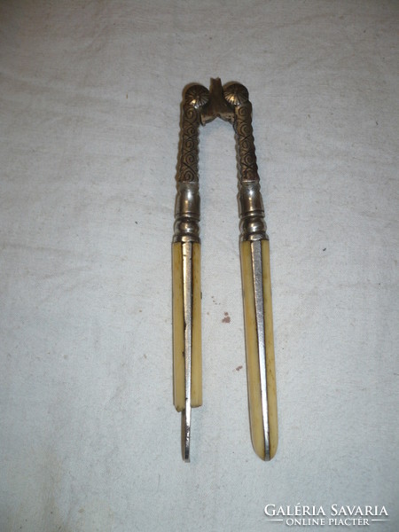 Antique decorative nutcracker with bone handle