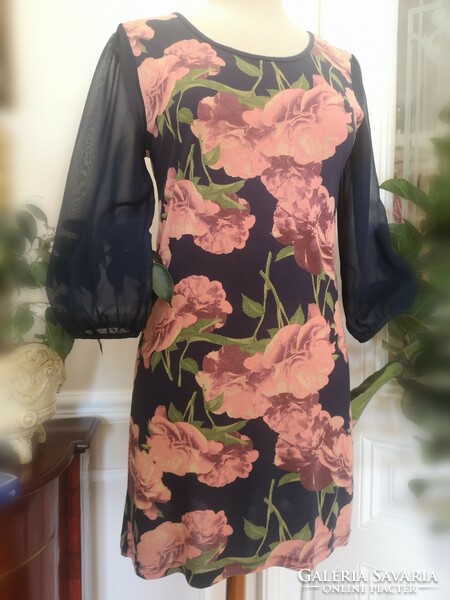 Next size 36 peony, powder pink dress, tunic on a blue background