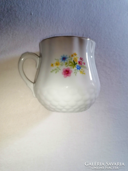 Vintage Zsolnay mug with spring flower bouquet