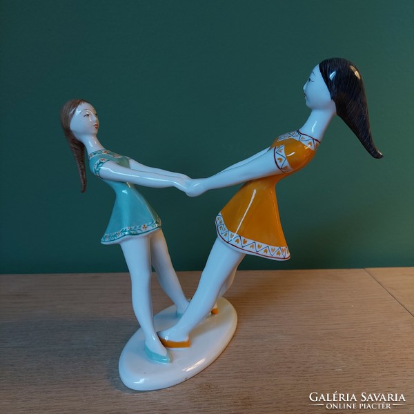 J. Márta Seregély porcelain figurine of spinning girls from Hólloháza
