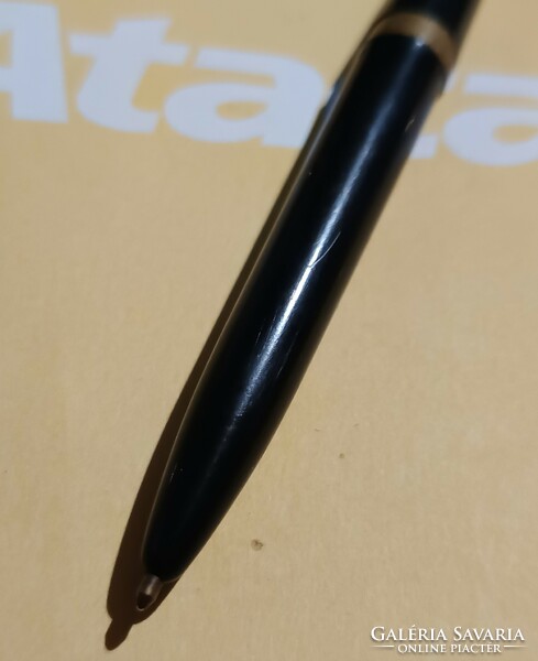 Old ballpoint pen. With a copper ring.