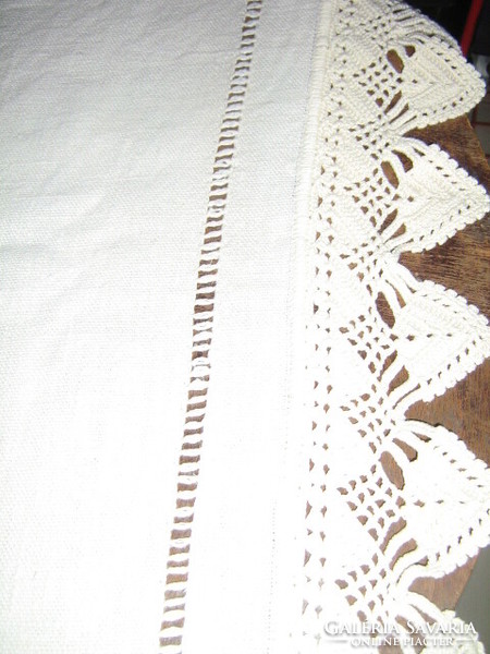 Beautiful antique off-white elegant woven tablecloth with crocheted edges