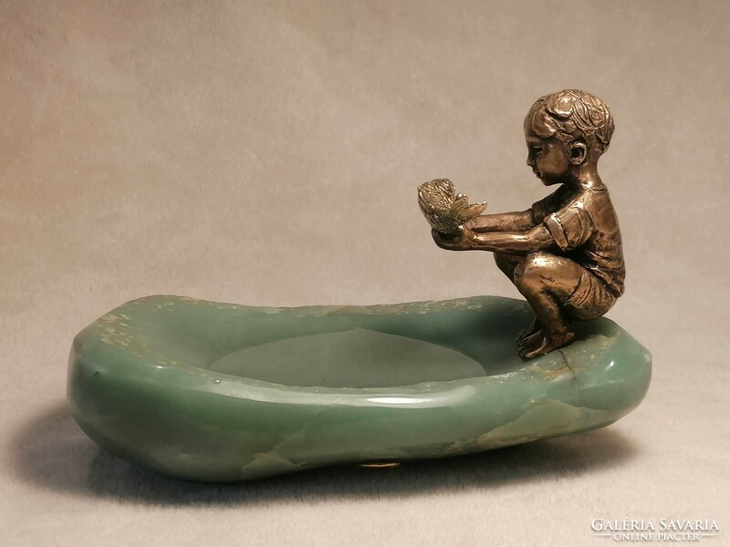 The goldfish and the boy bronze statue