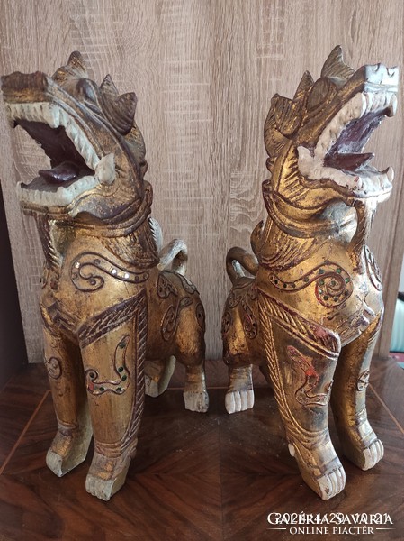 Pair of wooden oriental foo statues