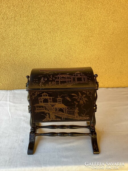 Oriental lacquer painted leaf chest with pearl tapestry.