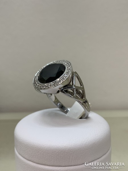 Gold ring with a giant black diamond