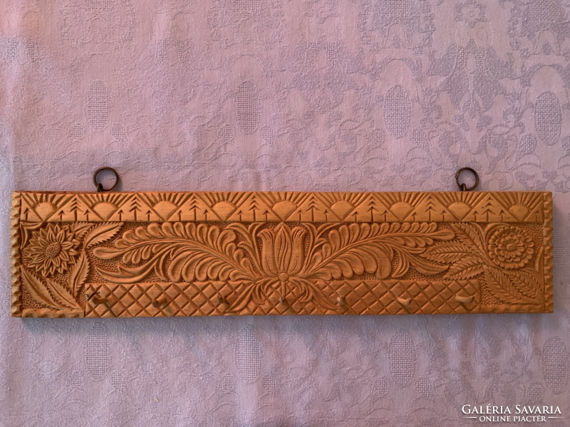 Hand carved towel rack and hanger