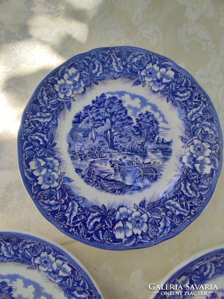 Italian faience plates with classic blue and white decor