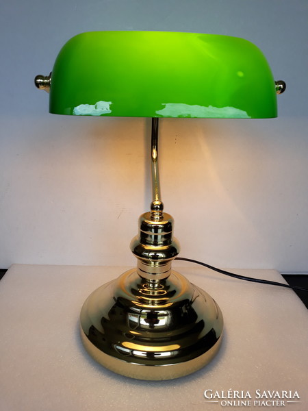 A very nice copper bank lamp with a green glass shade