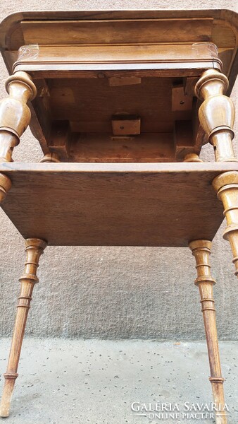 Antique small wooden table with beautiful shapes