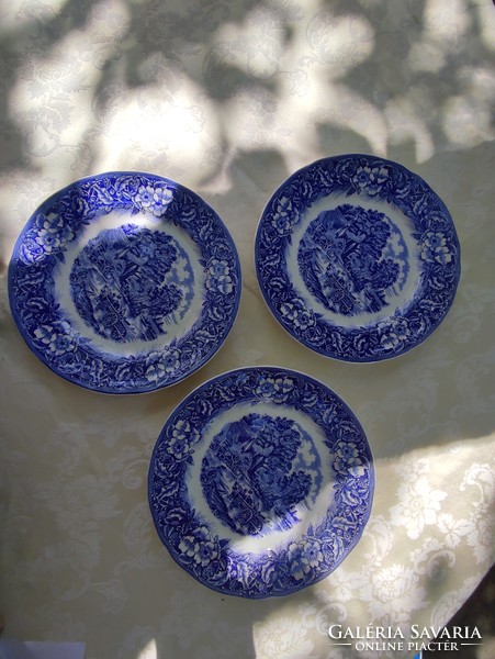 Italian faience plates with classic blue and white decor
