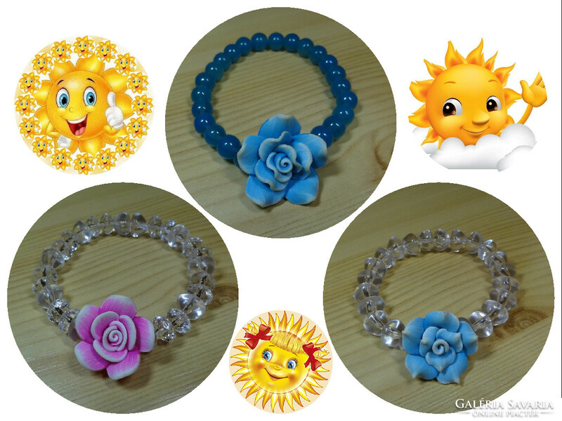 Glass and acrylic bracelets decorated with 2 colored fimo roses.