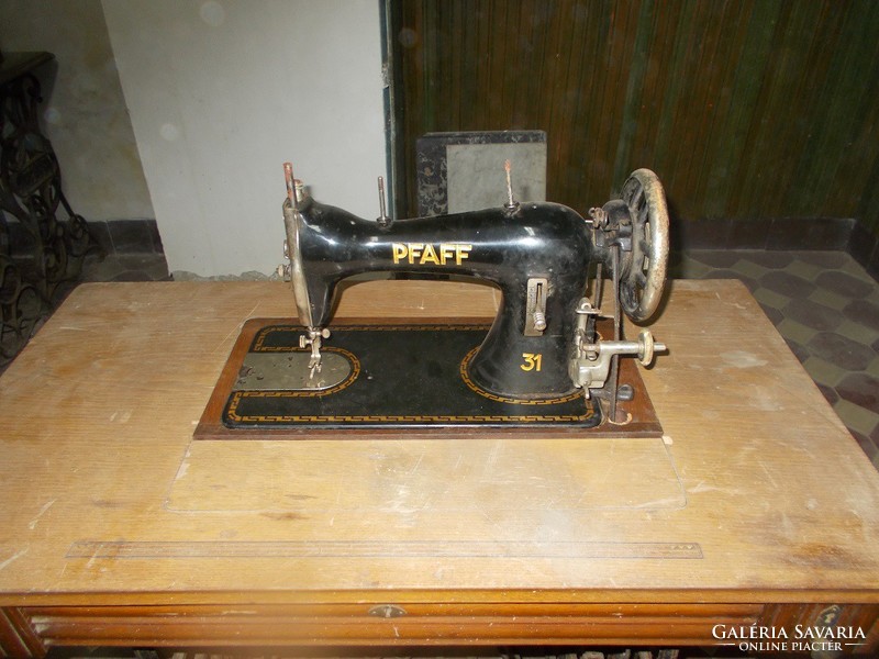With Pfaff sewing machine papers