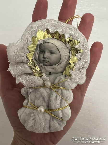 Swaddling baby Christmas tree decoration from old and new materials from papers