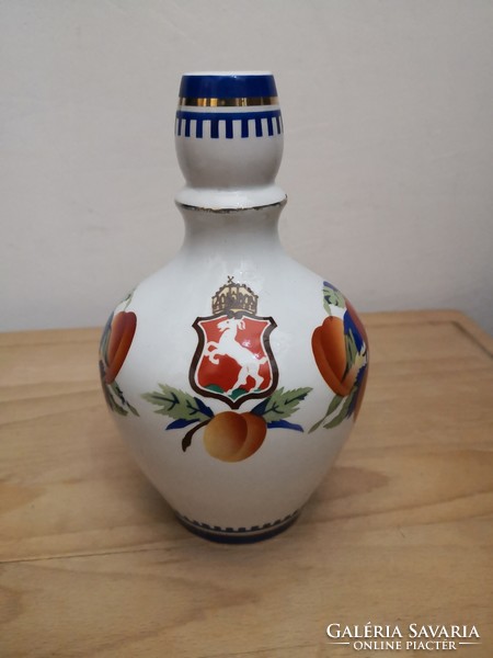 Granite ceramic pitcher with coat of arms.
