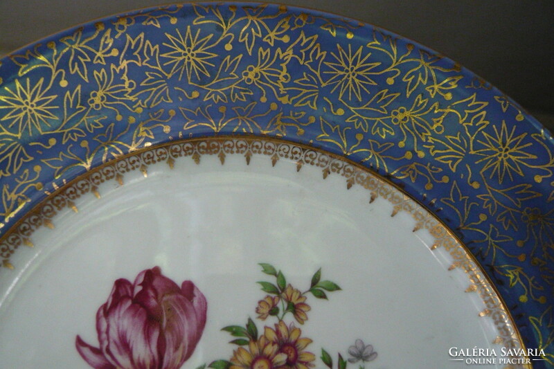 25 cm diameter porcelain bowl with pirkenhammer flowers with a blue edge