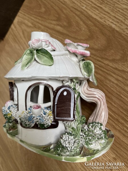A very beautiful, meticulously crafted porcelain elf house.