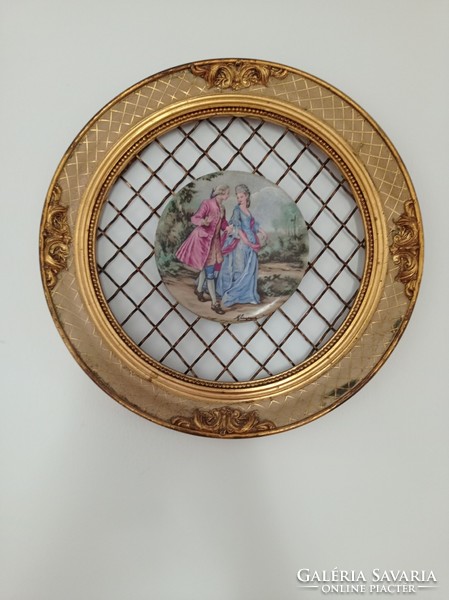 Antique baroque pictures in gold frames
