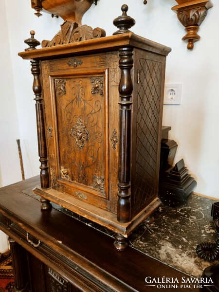 An antique Neo-Renaissance small cabinet that can also be mounted on the wall, with decorative copper handles