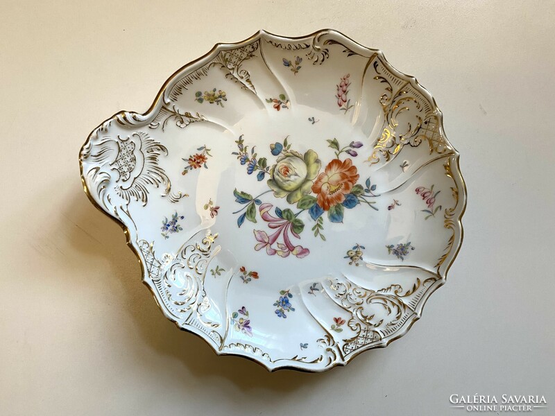 Porcelain serving bowl decorated with painted antique flowers